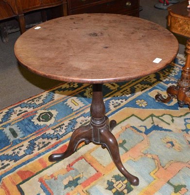 Lot 502 - Mahogany revolving tripod table with birdcage supports