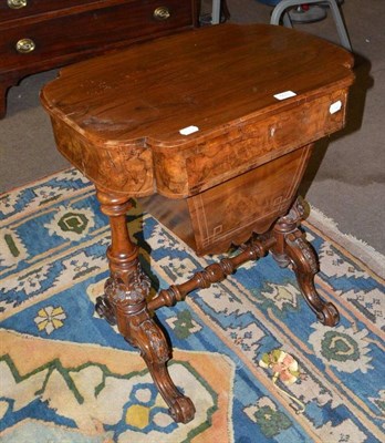 Lot 503 - A Victorian walnut work table with later top