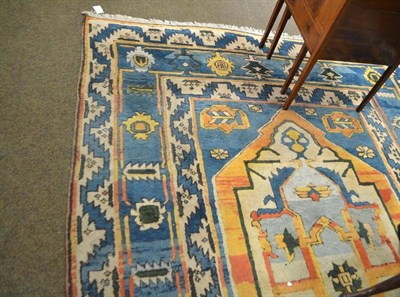 Lot 509 - A woolen ground Afghan carpet