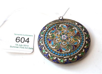 Lot 604 - A Russian Enamelled and Silver Gilt Locket, early 20th century, of flattened circular form, the...