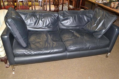 Lot 518 - Black leather sofa on chrome legs