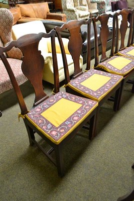 Lot 522 - A set of six Georgian mahogany dining chairs with carved splats