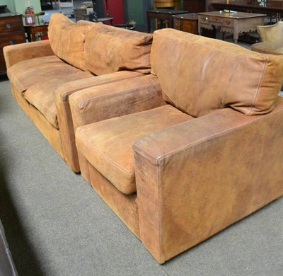 Lot 526 - A modern leather three seater settee and an armchair