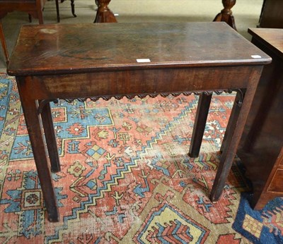 Lot 533 - A 19th century mahogany side table with carved detailing