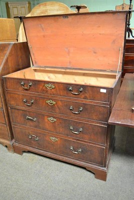 Lot 544 - A George III mahogany chest of drawers with hinged top and two dummy drawers