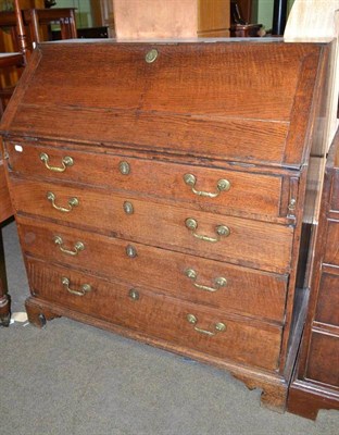 Lot 545 - An 18th century oak bureau