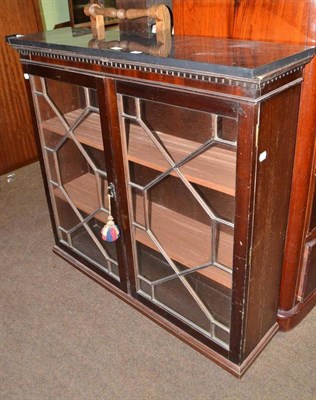 Lot 559 - A Victorian mahogany bookcase top with a later marble mount