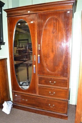 Lot 573 - An Edwardian mahogany wardrobe