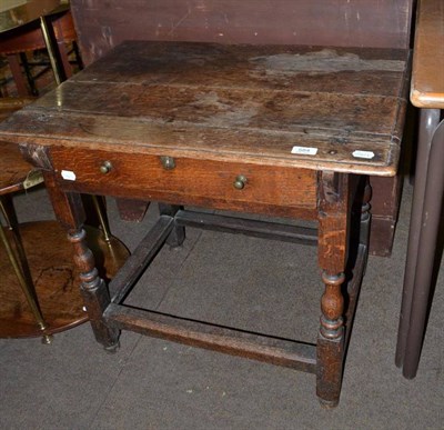 Lot 584 - A late 18th century oak side table with single drawer