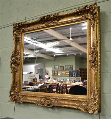 Lot 587 - A large gilt framed mirror