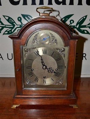 Lot 593 - A mahogany mantel clock with silvered dial by Webster, Queen Victoria Street, London