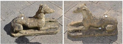 Lot 686 - Two reconstituted stone model of a seated greyhound on rectangular plinth