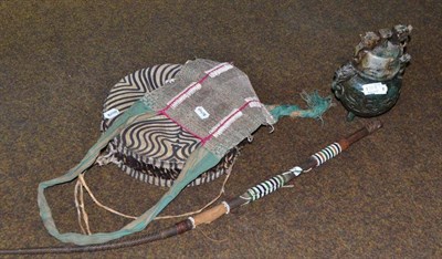 Lot 130A - Carved soapstone koro and cover and zulu bull whip, small drum and an African bag