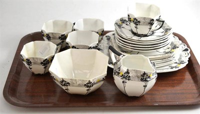 Lot 45 - A Shelley Sunrise and Tall Trees pattern tea service (11479) comprising five cups (two...