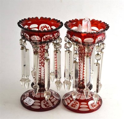 Lot 51 - A pair of clear glass lustres with ruby overlay and shaped rims