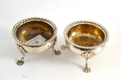 Lot 61 - A pair of George II silver salts with shell cast feet