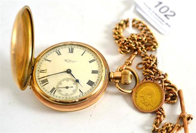 Lot 102 - A Waltham pocket watch, an Albert chain and a 1/2 sovereign