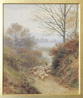 Lot 635 - Frederick Williamson (c.1835-1900) Sunlit landscape with shepherd and sheep on a lane Signed,...