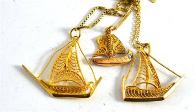 Lot 119 - Three yellow metal filigree boat pendants on chains