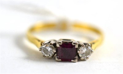 Lot 121 - A ruby and diamond three stone ring