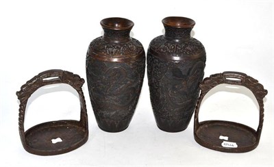 Lot 148 - Pair of Chinese bronze stirrups and pair of Oriental vases