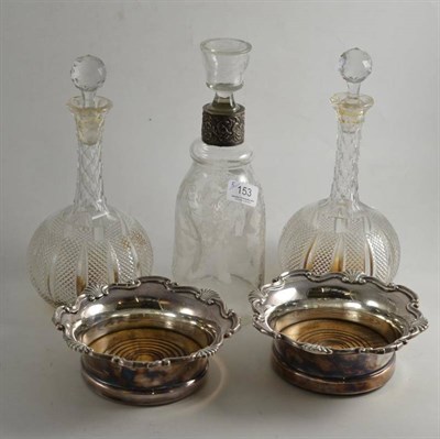 Lot 153 - Pair of plated coasters and decanters together with an etched decanter and stopper