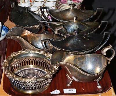 Lot 169 - Plated gallery tray, four sauce tureens and covers, pair of sauce boats and a decanter stand