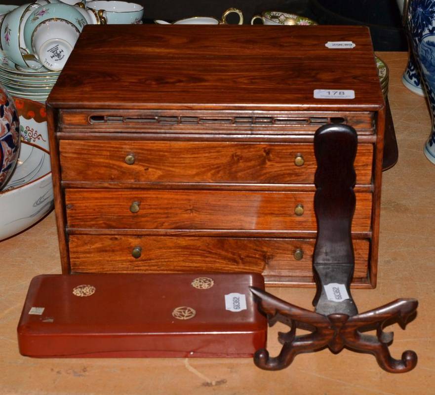 Lot 178 - Chinese wooden small chest, Chinese hardwood plate stand and Japanese ink slab in lacquer case