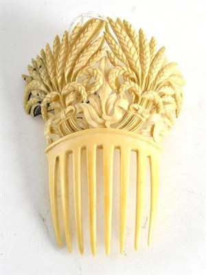 Lot 186 - A 19th century carved ivory hair grip