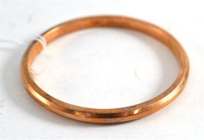 Lot 216 - A 9ct gold bangle