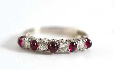 Lot 246 - A diamond and ruby ring