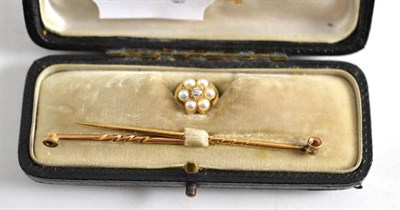 Lot 252 - Pearl and diamond set stick pin (with extra stick) in a fitted case