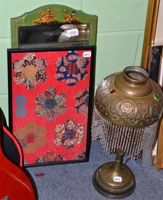 Lot 258 - Green lacquered Japanned mirror, a patchwork fragment and a brass oil lamp (converted)