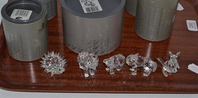 Lot 292 - Five Swarovski crystal figures including standing wolf, elephant, kangaroo and joey, bear with...