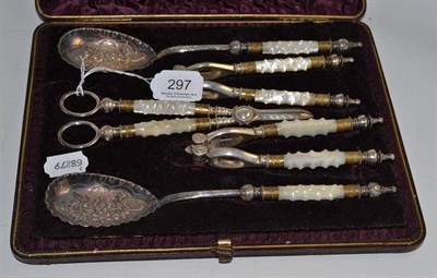 Lot 297 - Plated set of nut crackers, grape scissors and spoons in a fitted case