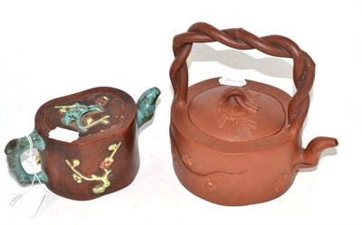 Lot 300 - Two terracotta teapots