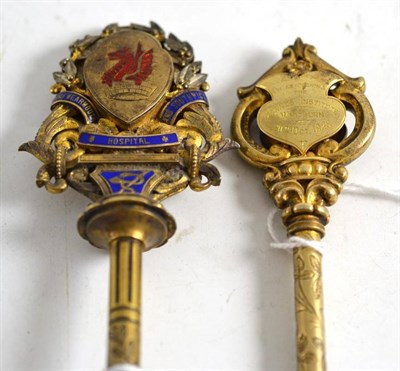 Lot 343 - A silver gilt presentation key with blue and red enamel decoration presented to Lady Elizabeth...