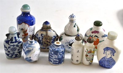 Lot 352 - A Chinese blue and white porcelain snuff bottle, 19th century, cylindrical, painted with the...