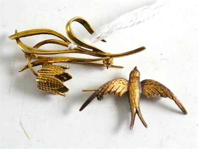 Lot 357 - A 15ct gold Swallow brooch and 9ct gold floral brooch (2)