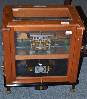 Lot 393 - Stanton Instruments precision chemical balance in glazed wooden cabinet, with identifying tag dated