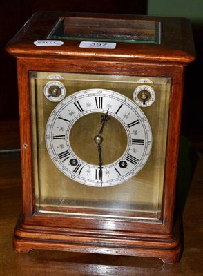 Lot 397 - French oak four plate twin train mantel clock