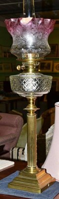 Lot 400 - Corinthian column oil lamp and etched shade