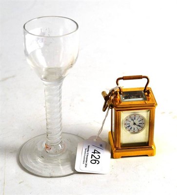 Lot 426 - Miniature carriage clock and early wine glass