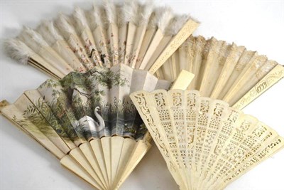 Lot 446 - Three late 19th century/early 20th century ivory fans with fabric mounts and a bone brisee fan (4)