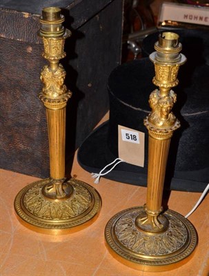 Lot 454 - A pair of French Empire style table lamps converted from candlesticks