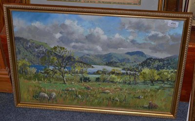 Lot 495 - Angus Rands (1922-1985) Sheep grazing by Ullswater, signed, pastel