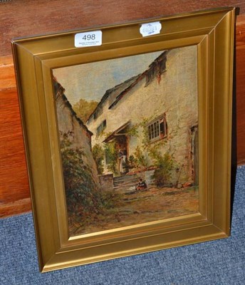 Lot 498 - Follower of Helen Allingham (19th/20th century), a lady, child and a cat outside of a cottage,...