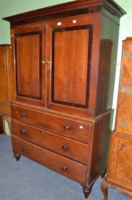 Lot 569 - A 19th century oak and mahogany inlaid kitchen press over three drawers