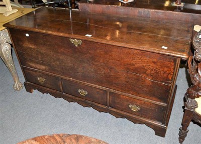 Lot 575 - An 18th century oak mule chest