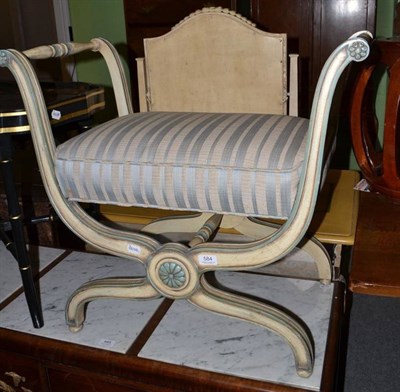 Lot 584 - Cream painted x-framed stool with striped upholstered seat